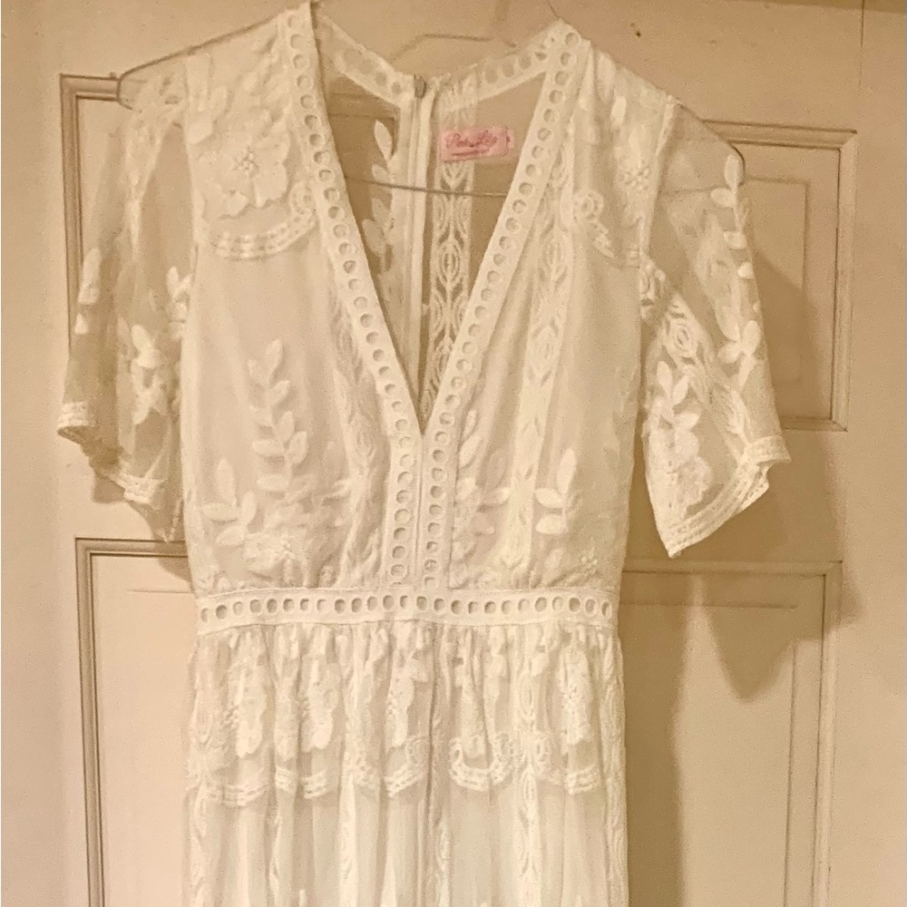 Pink Lily size small in white